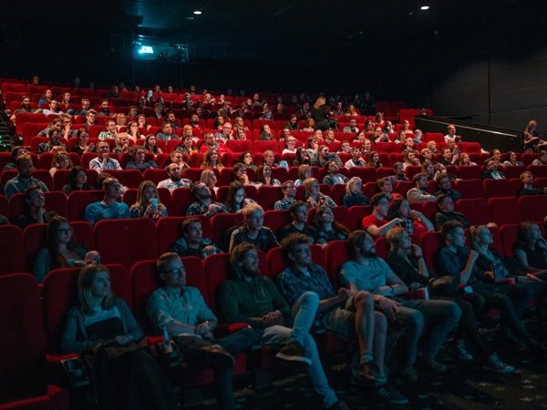 moviegoers inside a HOYTS cinema