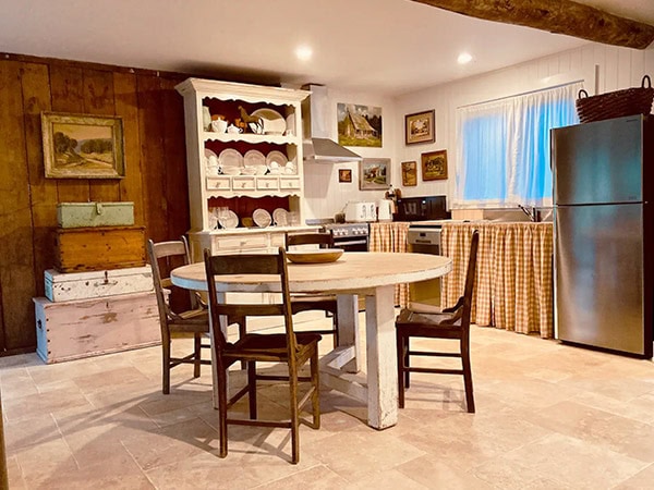 kitchen table inside Cowboy’s Cabin on Wollombi Brook, Hunter Valley NSW
