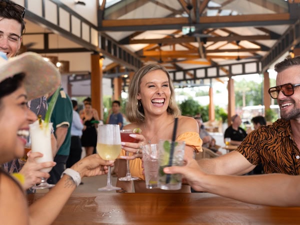 friends enjoying tropical cocktails at Darwin Airport Resort