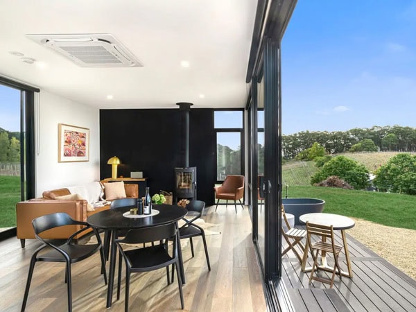 the interior of Espira Airbnb with floor-to-ceiling windows