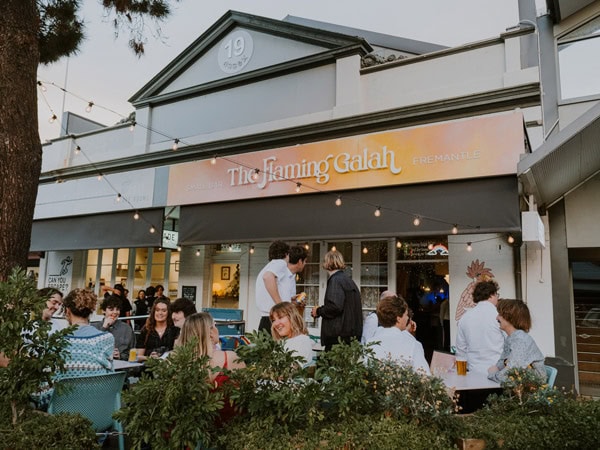 people dining outside Flaming Galah bar in Fremantle
