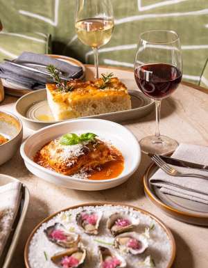table full of dishes at Folk Lounge & Dining at Tradies Gymea