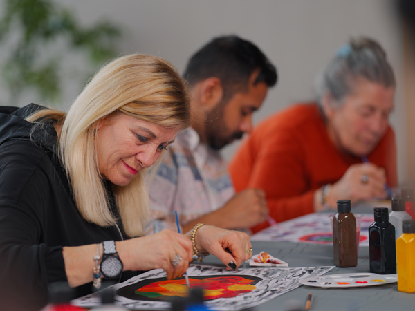 General image of people taking a painting class