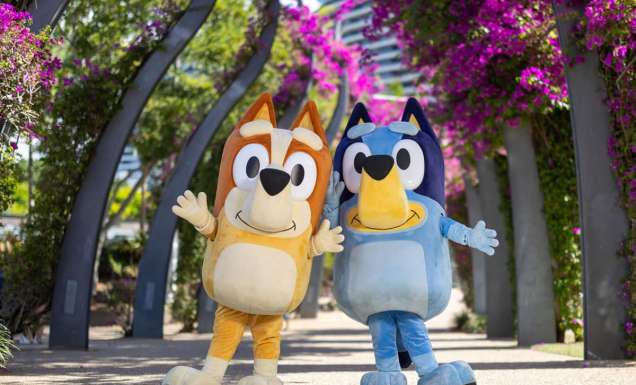 Bluey and Bingo along the Grand Arbour’s vibrant Bougainvillea flower display