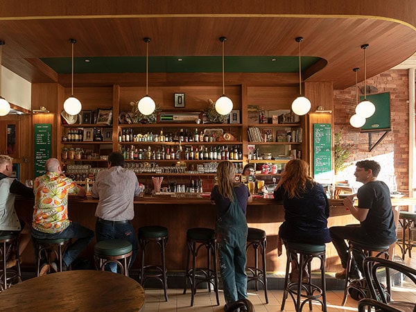 patrons sitting at the bar at Love Shack Public Bar And Bistro in Castlemaine Victoria