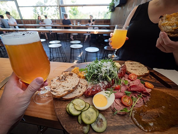 beer and food on table at Bruhaha Brewery in maleny queensland
