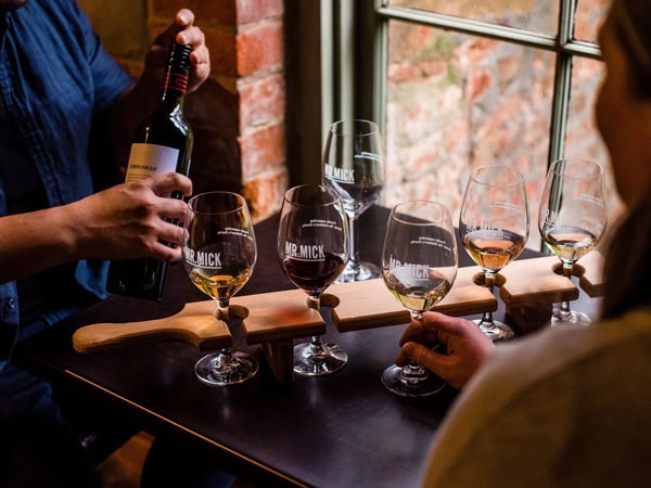 a selection of wine presented in a row for tasting at Mr. Mick Cellar Door