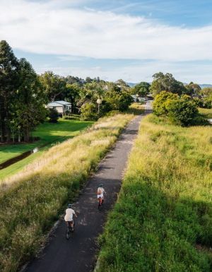 Aerial view of cyclers on the Northern Rivers Rail Trail