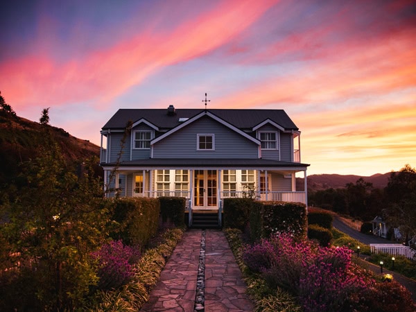 the Nimbo Fork Lodge against the fiery and dimming sky