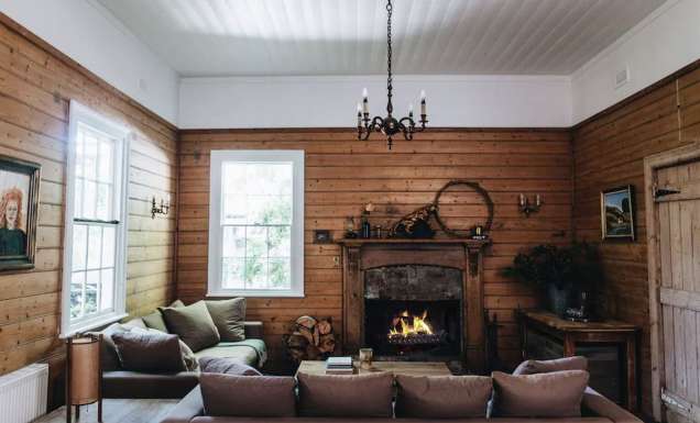 lounge room and fireplace at Poet's Lodge, Daylesford VIC