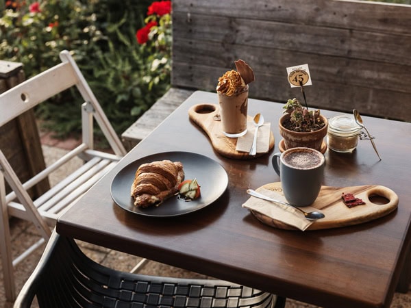 bread and coffee on the table at Red Cacao cafe in Stirling