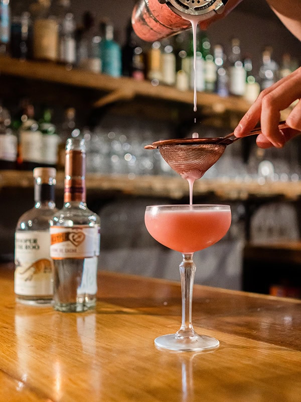 bartender making a cocktail with handcrafted gin at Bellarine Distillery