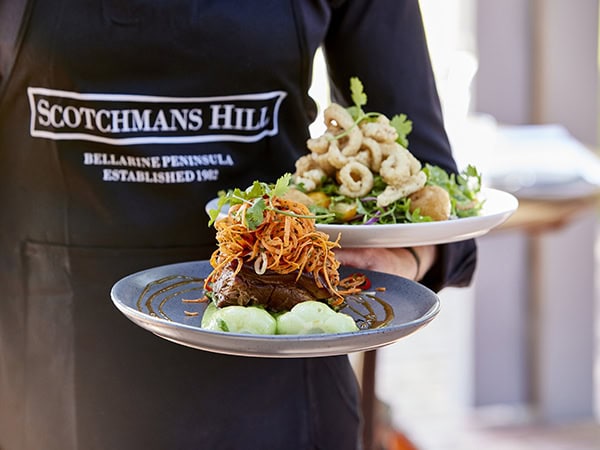 waiter carrying food at the Scotchmans Hill