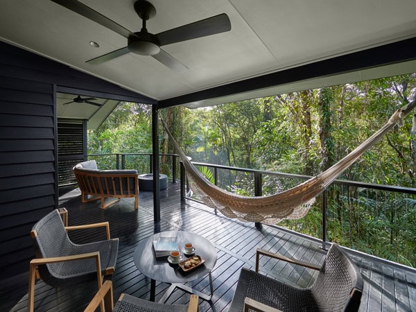 a hammock on the balcony of Silky Oaks Lodge