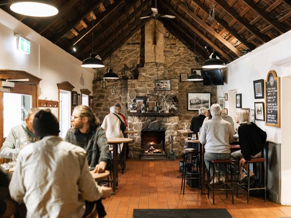 people dining inside Stanley Bridge Tavern