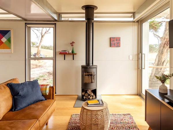 a living room with a fireplace at The House on Soul Hill, Adelaide Hills