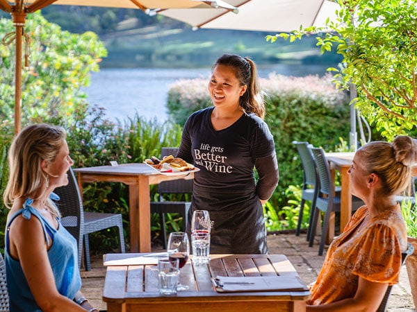 patrons being served at The Lake House Denmark cellar door, restaurant and cafe in Denmark western australia