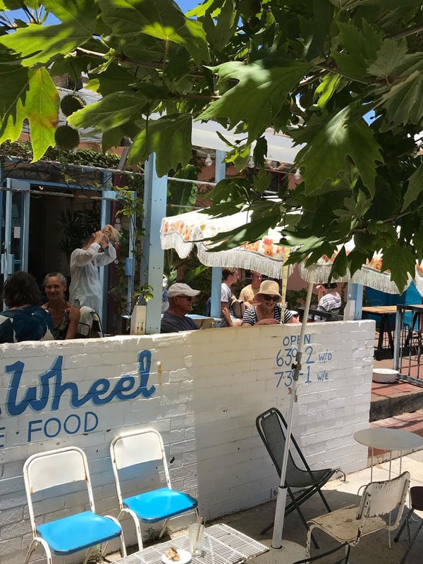 the chairs under a canopy outside Third Wheel cafe in Fremantle