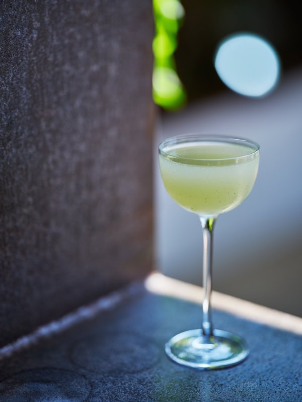 a glass of green drink at The Trader Bar, Darwin