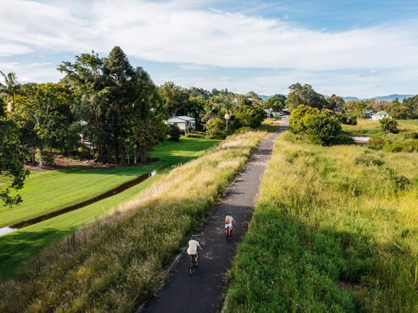 cycling through the Tweed Rail Trail as seen from above