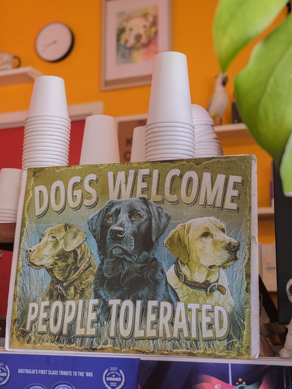 dogs welcome people tolerated illustration at Two Dogs Laughing cafe