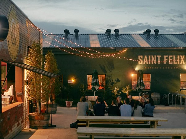 a group of people dining at Urban Ground’s outdoor area