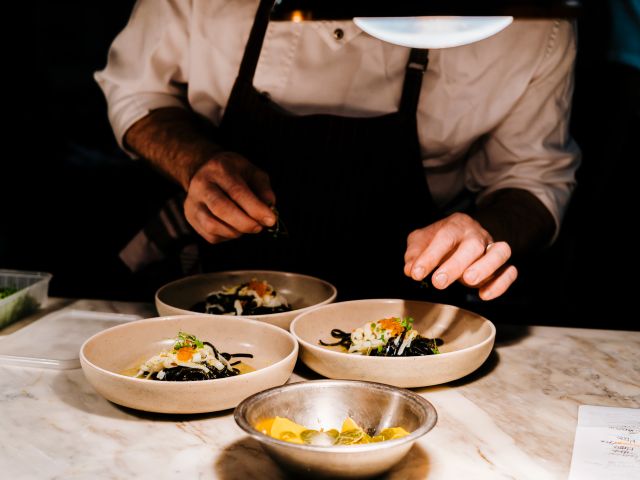 a chef preparing Italian dishes at Tipo 00, Melbourne
