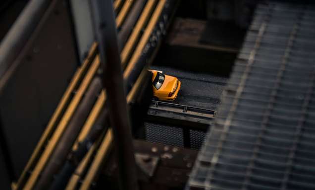 glimpse of a taxi crossing a bridge