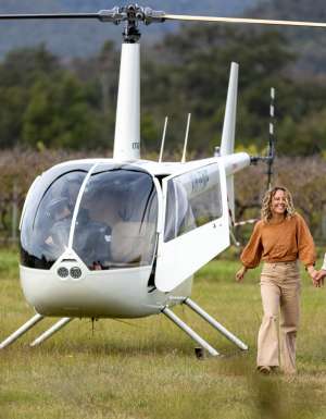 a couple enjoys a helicopter flight over the Hunter Valley with Hunter Valley Helicopters, Pokolbin, Hunter Valley