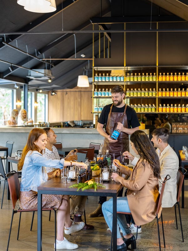 friends enjoying a gin and wine tasting session at Ambleside Distillers, Adelaide Hills