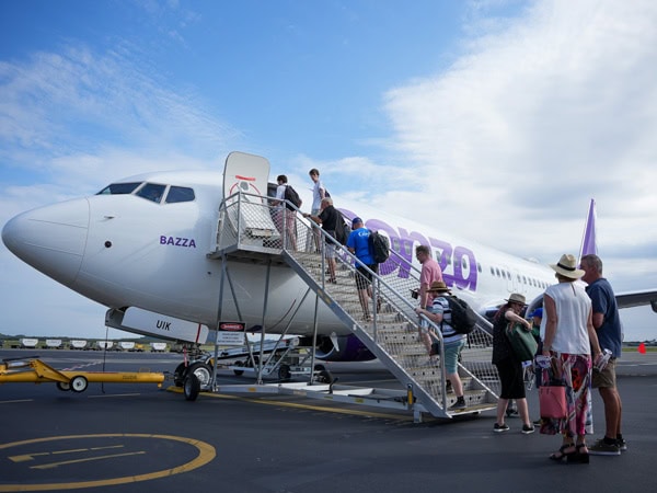 People boarding Bonza flight