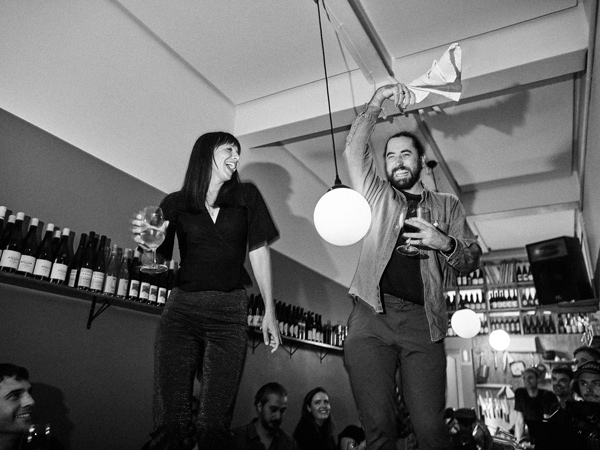 two people dancing with a wine in hand at Sonny, Hobart