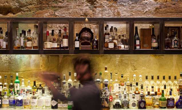 a blurry image of a bartender at Void Bar, Hobart