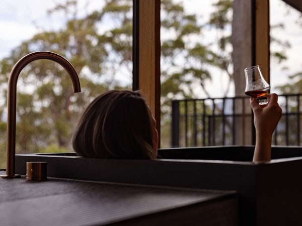 a woman enjoying wine while in tub at Hunter Huon Valley