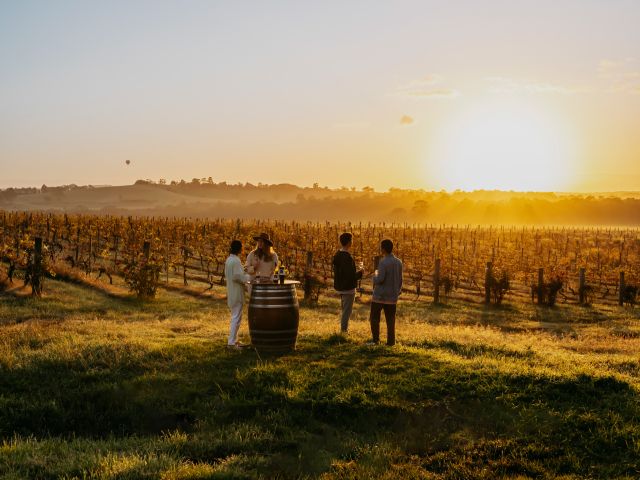 a group enjoying a sunset wine tasting at Hope Brewery, Pokolbin