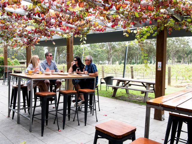 a group enjoying a tasting at IronBark Hill Brewhouse, Hunter Valley