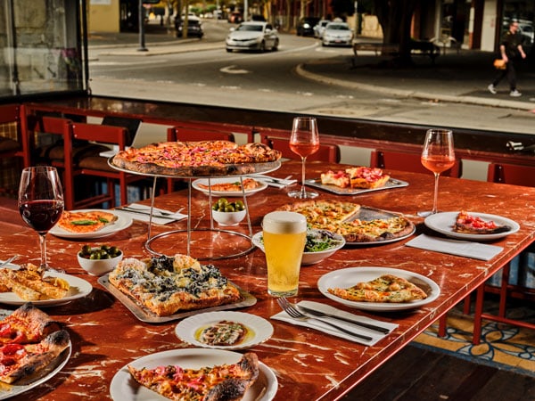 pizzas and negronis on the table at Lola's, Fremantle