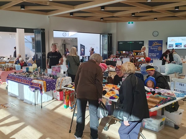 people browsing through stalls at Magill Sunrise Market