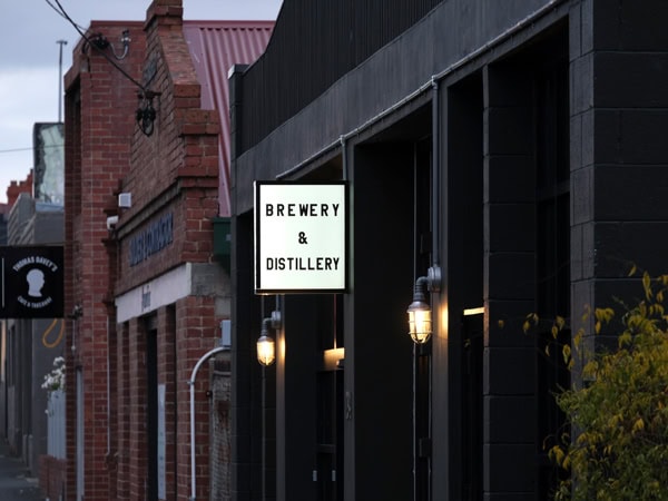 the exterior of Overland Brewers and Distillers with a signage