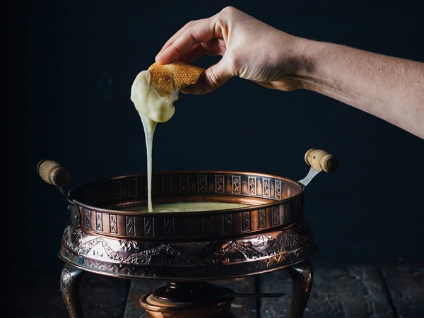 food dipped into cheese at Udder Delights