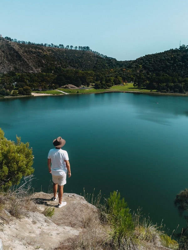 a man standing on the edge of a cliff at Valley Lake