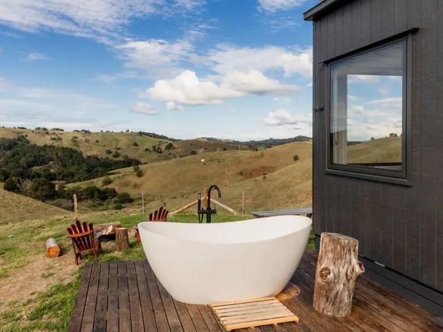 an outdoor bathtub at Aahana, Sunshine Coast Hinterland