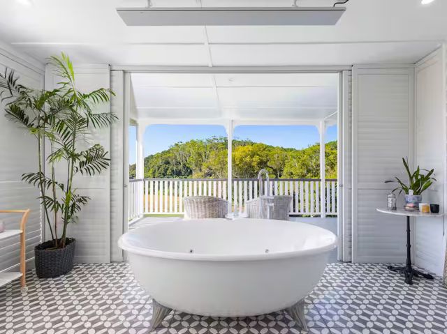 an indoor tub with Hinterland views at Bird Song Valley