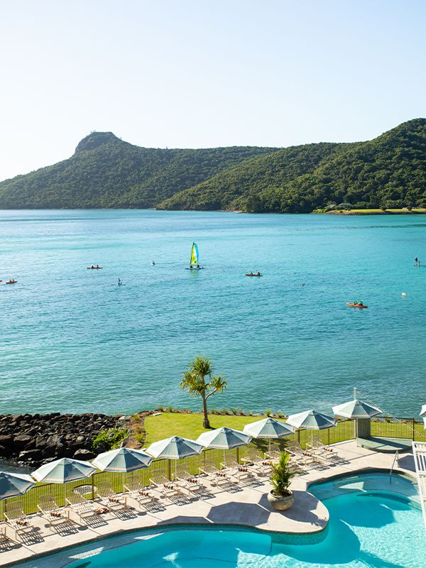 View over the pool to Catseye Bay from The Sundays Hamilton Island.
