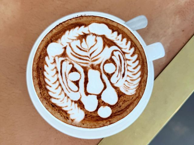 a cup of coffee with latte art at Bear Boy Espresso, Brisbane