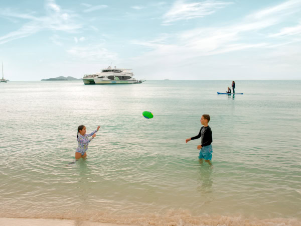 kids playing on the beach, Cruise Whitsundays