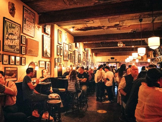 crowd of people dining in Earl’s Juke Joint, Newtown