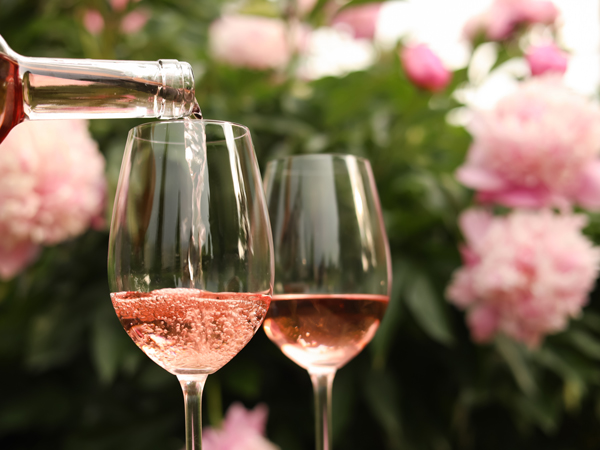 General getty image of wine being poured into glasses