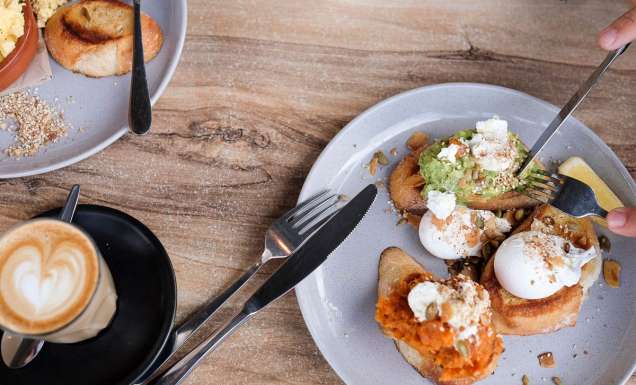 a plate of food with coffee at Bank Street + Co, Port Fairy