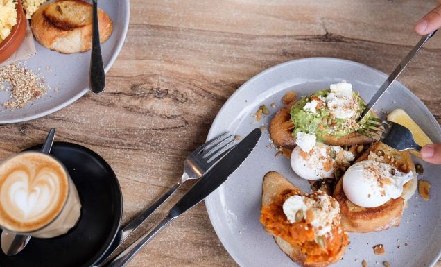 a plate of food with coffee at Bank Street + Co, Port Fairy